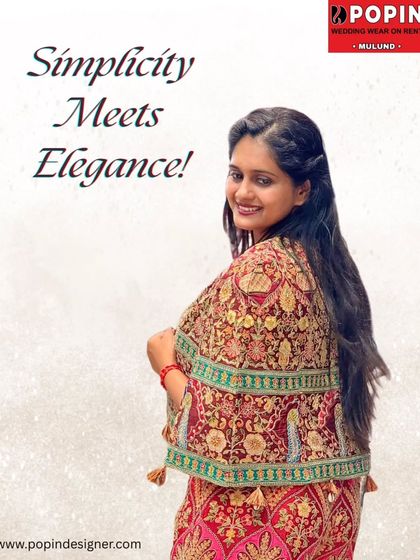 "Simplicity Meets Elegance". A close-up on the beautiful embroidery of the red plazo set, showing the detailed craftsmanship that makes this outfit special.