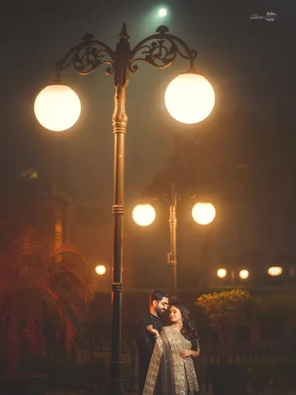 Under the soft glow of city lights, we create pure magic. This night portrait showcases my expertise in using ambient light to craft a moody, romantic, and unforgettable scene for your pre-wedding shoot.