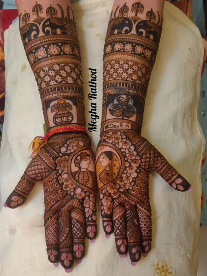 Your mehendi can tell your love story. For this bride, I included custom portraits of the couple inside ornate floral mandalas, making her bridal henna a truly personal keepsake of her special day.