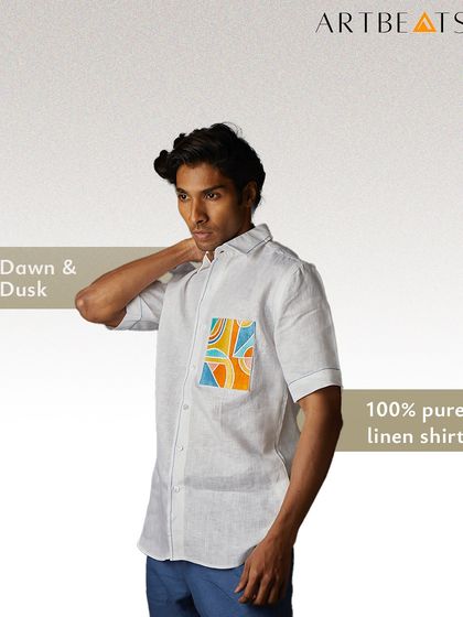 The Dawn & Dusk design on a 100% pure linen men's shirt. This version offers a more tailored fit, perfect for business casual or weekend wear, with the same artistic pocket detail.