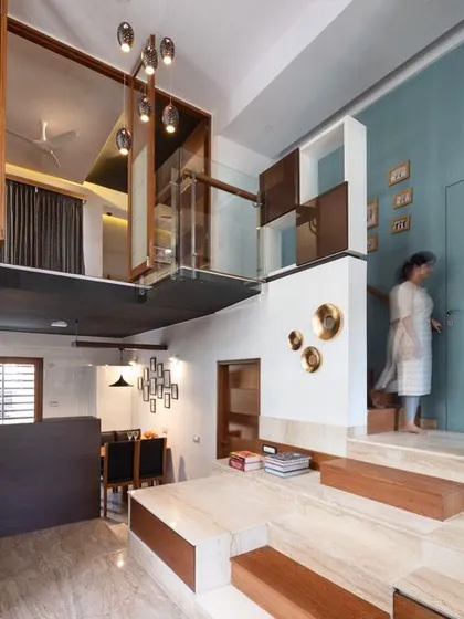 We see architecture as a tool for connection. In this residence, we used split levels and a floating bridge to link different living zones, creating visual interest and encouraging interaction between spaces while maintaining an open, airy feel.