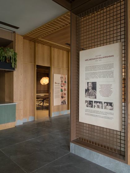A tribute to the school's founders is elegantly displayed on a mesh panel in the lobby. This design element honors the institution's legacy while maintaining a modern aesthetic.