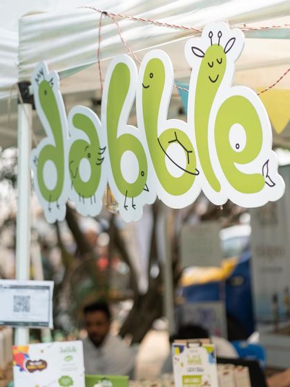 The "Dabble" sign from one of our art supply vendors. I look for brands with a strong, child-friendly identity that offer safe and non-toxic creative products for your little ones.