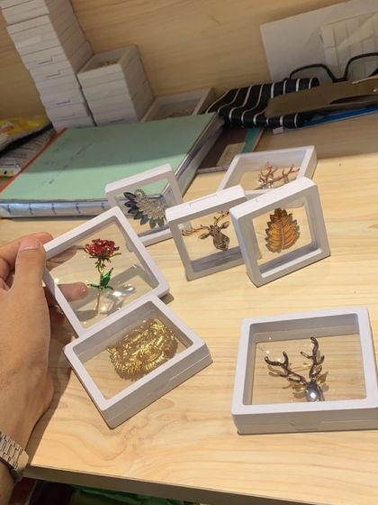 It's all about the details. These are some of the custom brooches and lapel pins we use to add a final, personalized touch to our suits and sherwanis.