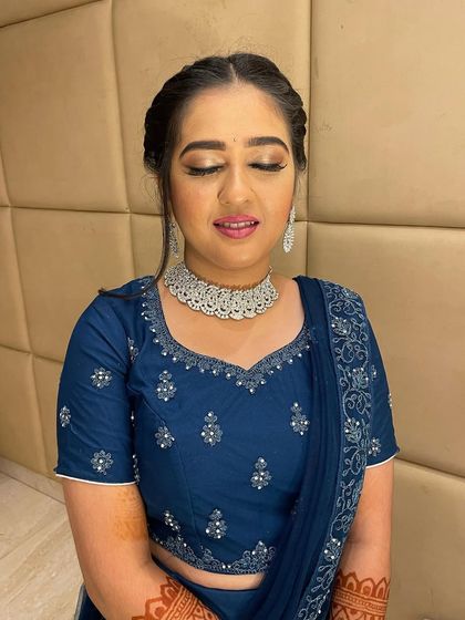 Deepika's engagement look, featuring a soft glam eye with a winged liner and a natural pink lip. This is a raw, unedited photo showing the true finish of the makeup.