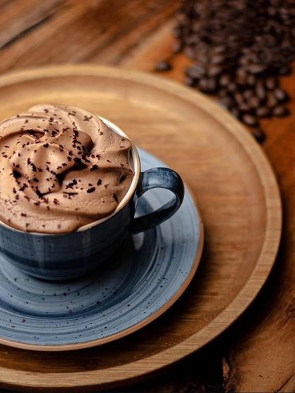A decadent cup of our hot chocolate, topped with a generous swirl of chocolate cream. The perfect pick-me-up.