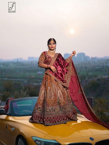 A powerful stance that combines traditional grace with modern confidence, perfect for a contemporary bridal fashion story.