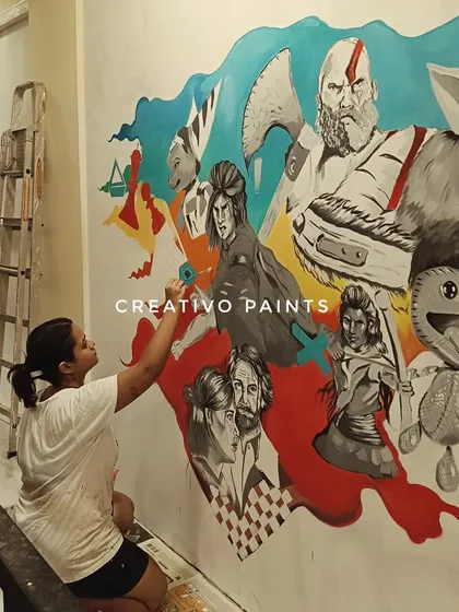 A shot of me working on the finer details of the mural. Each character gets individual attention to ensure the colors and shading are just right.