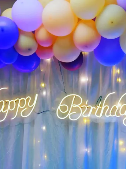 A neon "Happy Birthday" sign from Inaya's party. This was just one element of the complete event planning service I provided, which included everything from tenting to tattoo artists.