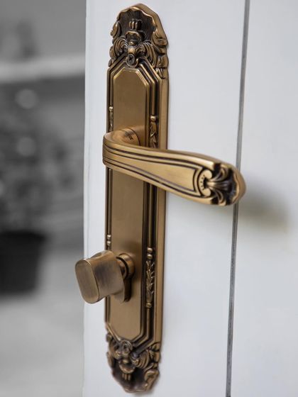 Our Mumtaz collection handle, finished in Antique Gold, gracing the entrance of a client's beautiful residence. This piece is a statement of style and sophistication, blending form and function perfectly.