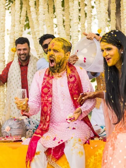 The wild, uninhibited joy of a Haldi celebration in Gurgaon. We love it when everyone lets loose and has fun.