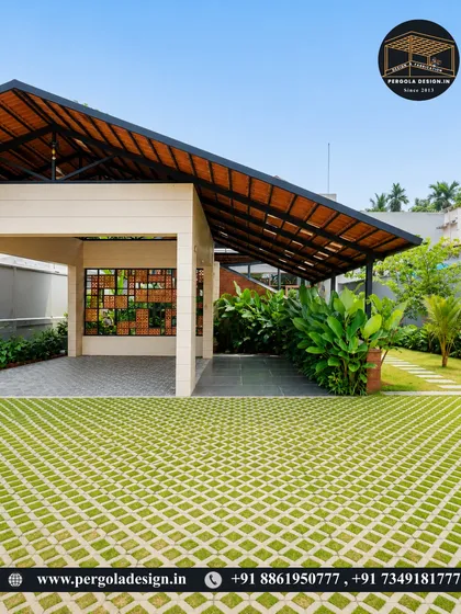 This carport features a unique roof design with a bamboo-like finish underneath the tiles, supported by a strong steel frame. It's a perfect example of how we can combine different materials and textures to create a custom look that is both natural and durable.
