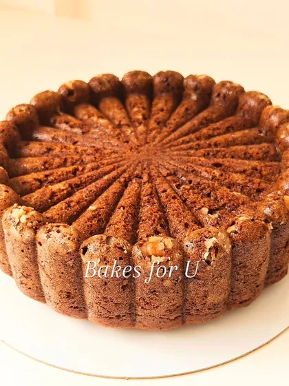 The classic whole wheat Bundt cake, unadorned. This shows the beautiful detail from the pan and the lovely texture of the cake itself, ready to be enjoyed as is.