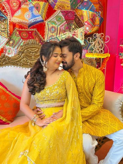 An intimate and romantic couple shot. The bride's makeup is soft and glowing, perfect for these close-up moments.