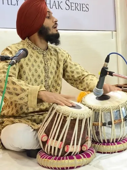 Focused on the bols during a Baithak Series concert. These intimate settings allow for a deep connection with listeners.