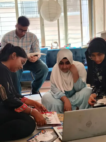 NEP volunteers from RJ College hard at work cataloging books. By organizing our resources, they're making sure the right stories reach the right children.