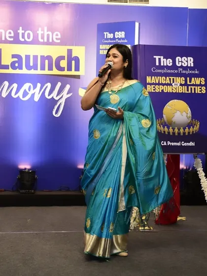 Presenting the grand book launch of 'The CSR Compliance Playbook'. I am often chosen to host formal launch ceremonies.