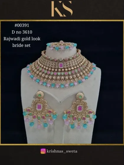 This multi-color version of our Rajwadi bridal set is perfect for a vibrant Mehendi or Sangeet look. The mix of pastel colors adds a playful yet elegant touch.