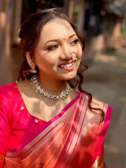 A bright and happy shot of the engagement look. The soft smokey eye and natural lip color create a balanced and timeless appearance.