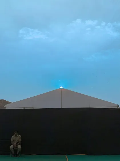 Another color variation of the sunset scene, with the sky edited to a solid blue, highlighting the shape of the sun.