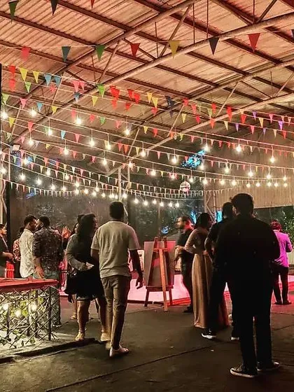 A lively party scene with guests enjoying the bar and dance floor. We can create a fun, club-like atmosphere for your corporate celebration.