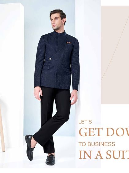Let's get down to business in a suit. This navy blue Jodhpuri suit with an asymmetrical cut is the perfect blend of professional sharpness and modern style.