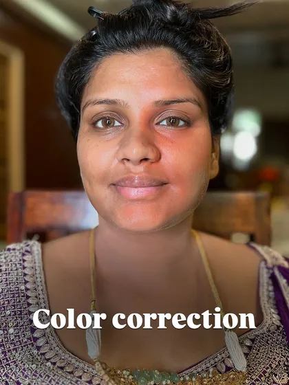 The first step in tackling discoloration is color correction. Here, you can see the application of a corrector to neutralize darker areas before applying foundation.