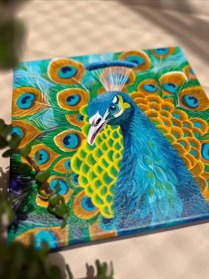 A different angle of my peacock painting, catching the light to show the texture and sheen of the acrylics. I love how the colors shift depending on the lighting.