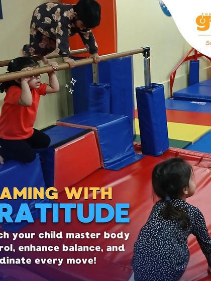 Beaming with gratitude. Children navigate a balance beam and bar setup, an obstacle that enhances body control and coordination with every move.