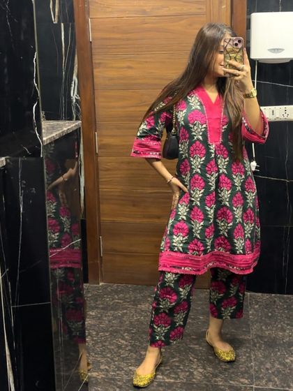 A classic block-print kurta set. This is a timeless ethnic look that is perfect for casual festive gatherings or pujas.