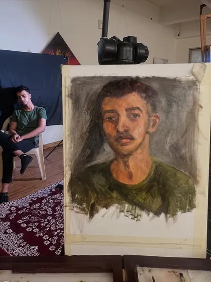 The portrait of Harsh on the easel during the five-and-a-half-hour session. Painting with other artists is always a fun and enriching experience, full of shared learning.
