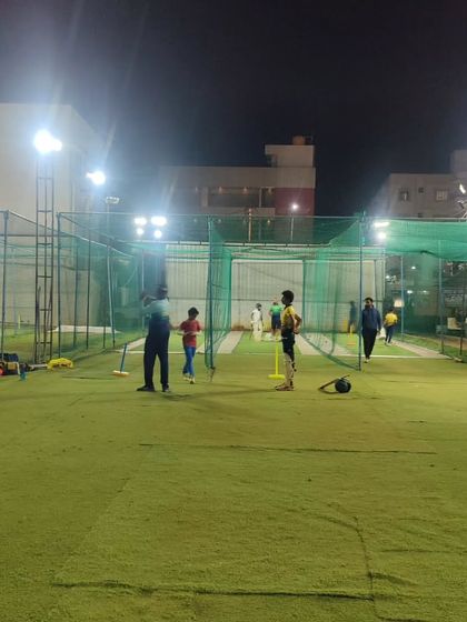 A view of our academy during a busy night session. The floodlights ensure that training can continue, offering flexibility for players with different schedules.