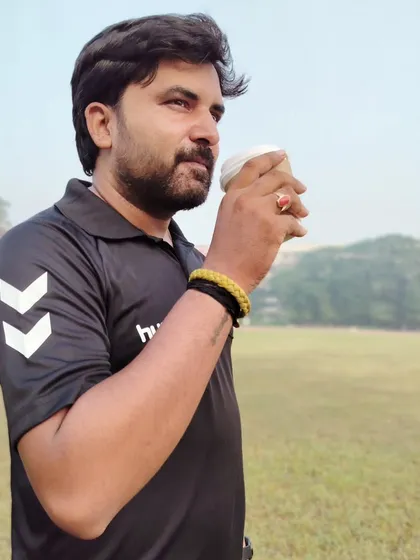 Enjoying a coffee on the field, ready for a day of hard work.