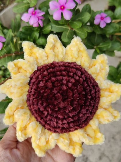 This plush sunflower is made with soft, velvety yarn, making it extra cuddly. It's a perfect gift for the soft-hearted sunshines in your life.