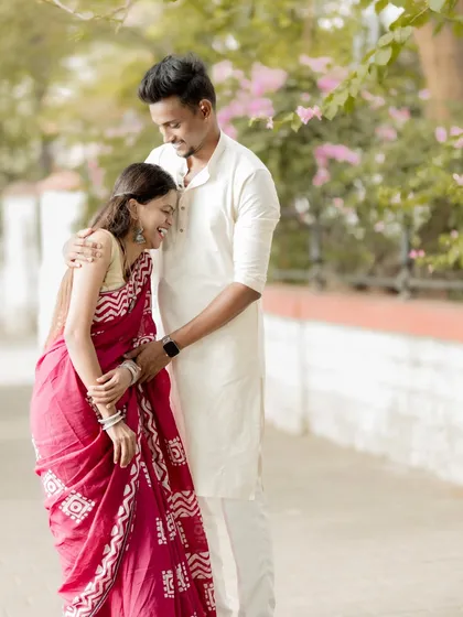 A candid moment of pure joy and laughter between a couple during their outdoor shoot in Mumbai. We believe the best photos are the ones that capture your real smiles and unguarded happiness.
