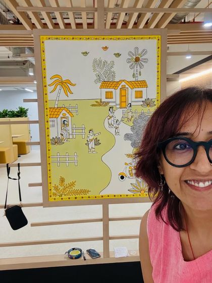 A happy selfie with my work at the Amazon office. Creating art that will be seen by hundreds of people every day is a huge honor.