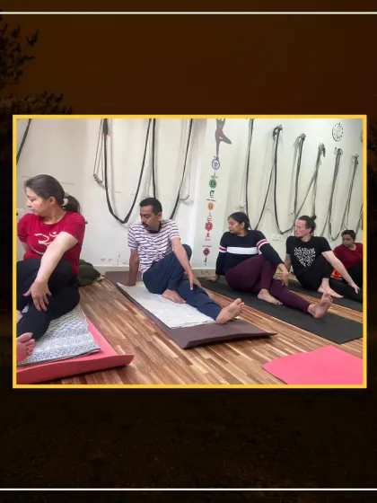 A class practices Vakrasana (Simple Twist Pose), a great asana for improving spinal flexibility and aiding digestion.