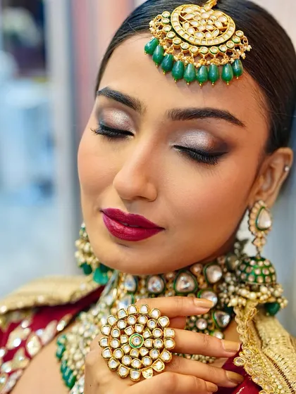 A bold bridal look with a metallic silver eyeshadow and a deep berry lip. This is for the modern, confident bride, and a style you will learn to create.