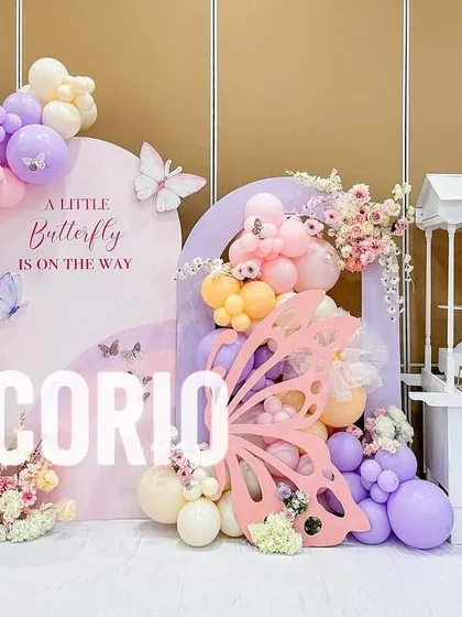 To complement the main backdrop, I can provide themed props like this white candy cart. It adds another focal point to the party and is perfect for displaying cakes, desserts, or party favors.
