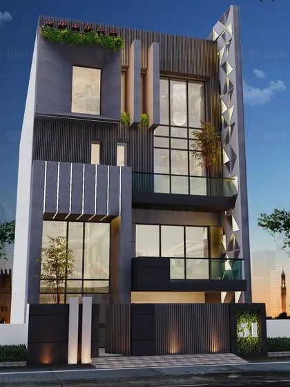 A dramatic night-time render for a 248 sq. yard home in Pitampura. The design features a striking geometric pattern on the side of the building, which is highlighted by integrated lighting.