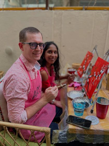 A couple enjoying a creative date at one of my cafe workshops. Painting together is a wonderful way to connect and create a shared memory.