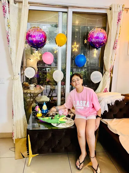 A full view of Momo's lovely birthday setup. Our bone-shaped cakes are a fun and whimsical choice for any dog's party.