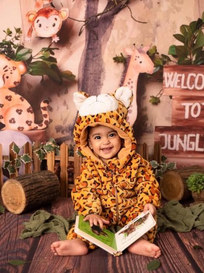 A quiet moment of reading in the jungle. Even the wildest explorers need a little downtime, and this shot captures a sweet, calm side of his personality.