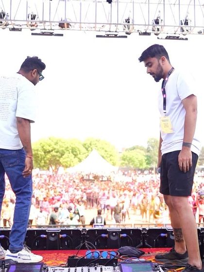 On stage at the Maha Holi festival, looking out at a sea of color and people. This two-day event brought together over 15,000 people for an unforgettable celebration.