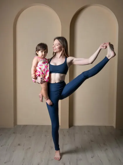 This is what my practice looks like now, and I wouldn't have it any other way. Holding my daughter while in Utthita Hasta Padangusthasana shows how yoga adapts to life. Motherhood has taught me that balance is not just about holding a pose, but about integrating my practice into my life as a new mom.