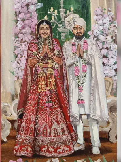 The full view of the live wedding painting, showing the couple in their beautiful red and white outfits against a backdrop of flowers.