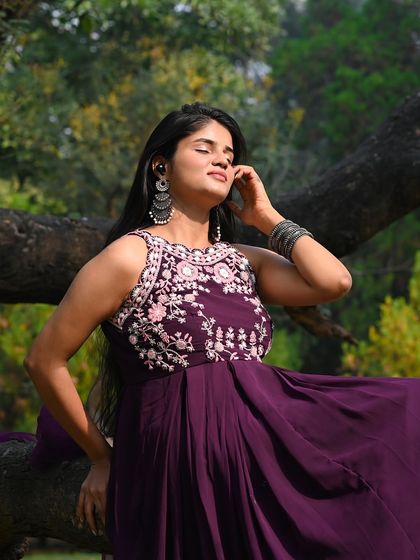 Another pose from the nature shoot, capturing a moment of peace and connection with the surroundings.