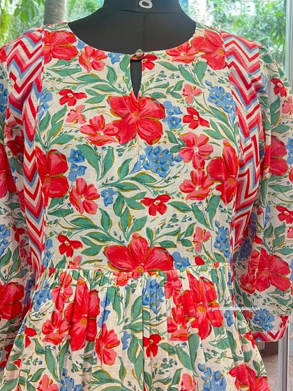 A close-up of our vibrant new festive printed collection. This floral and chevron print kurta is designed to help you celebrate in style.