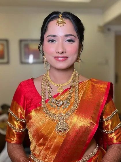 The complete look for my South Indian bride. Dressed in her beautiful Kanjeevaram saree and traditional gold jewelry, her makeup is the perfect finishing touch.