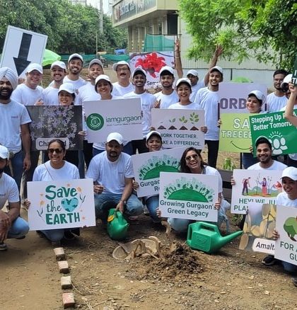 The Orbis Financial team celebrates their contribution to a greener Gurgaon after a successful plantation drive at Aravali Creek.